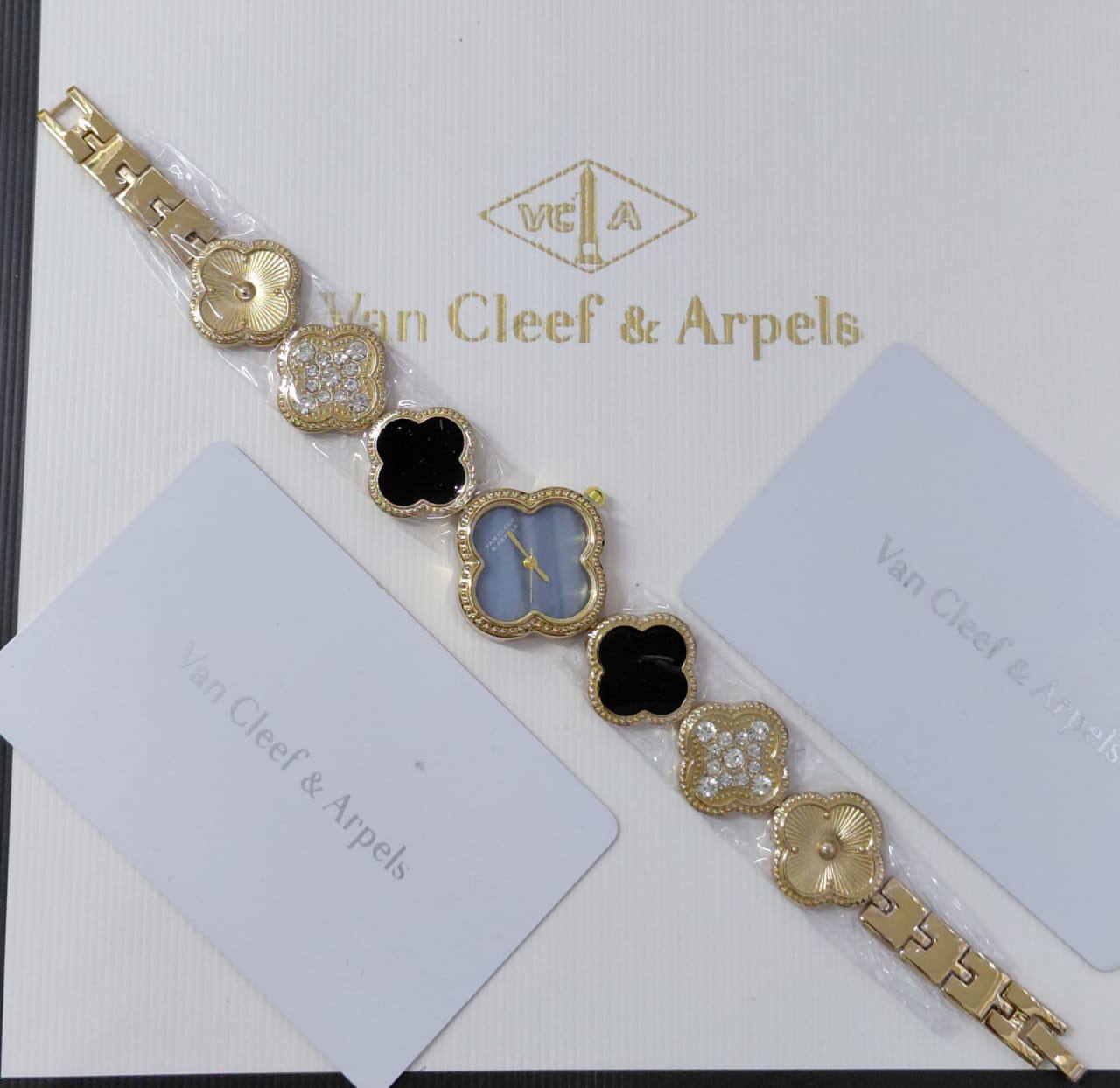 ساعة Van Cleef Alhambra ذهبية - وجه أزرق زهور سوداء